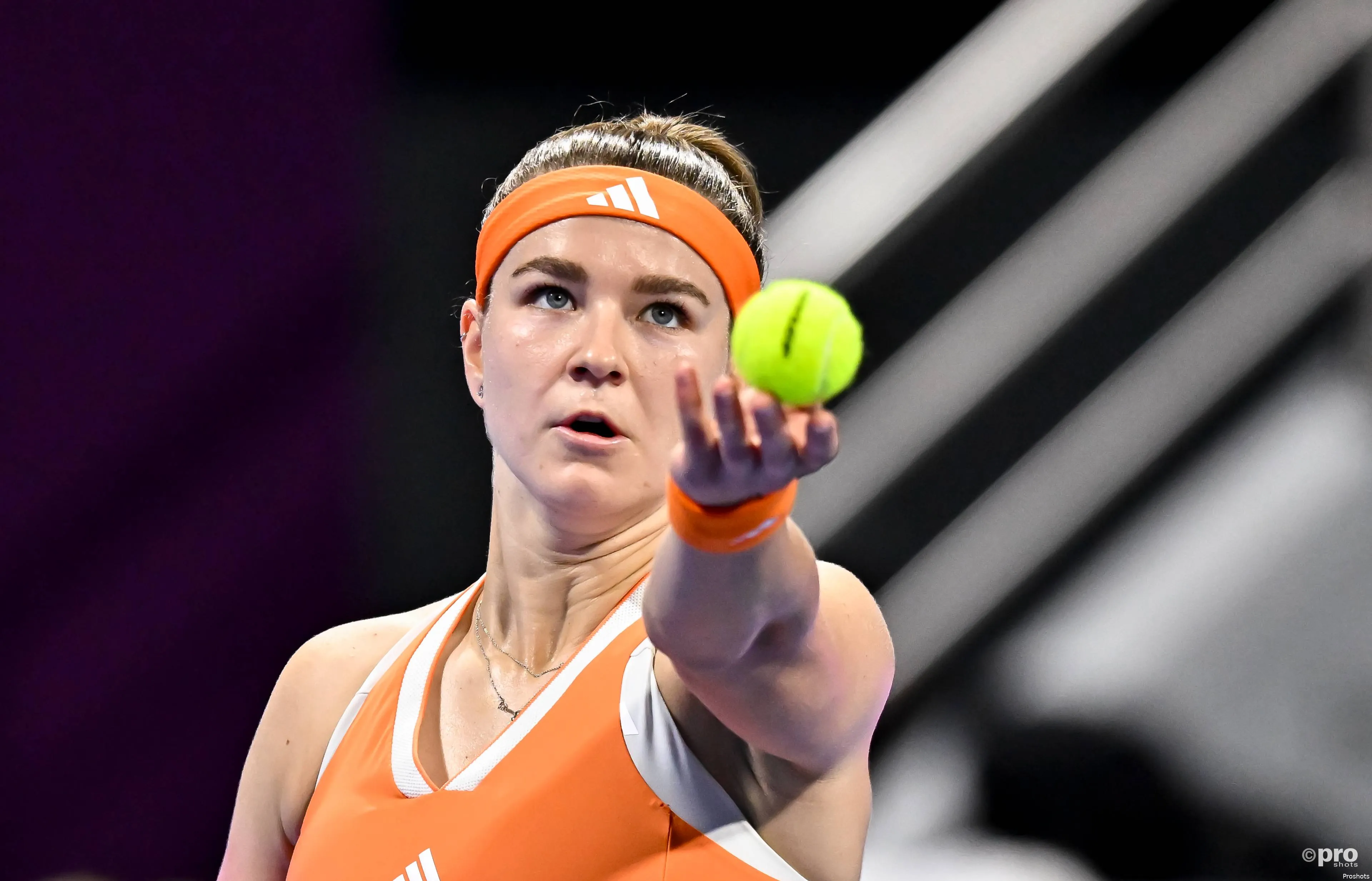 Karolina Muchova serves.