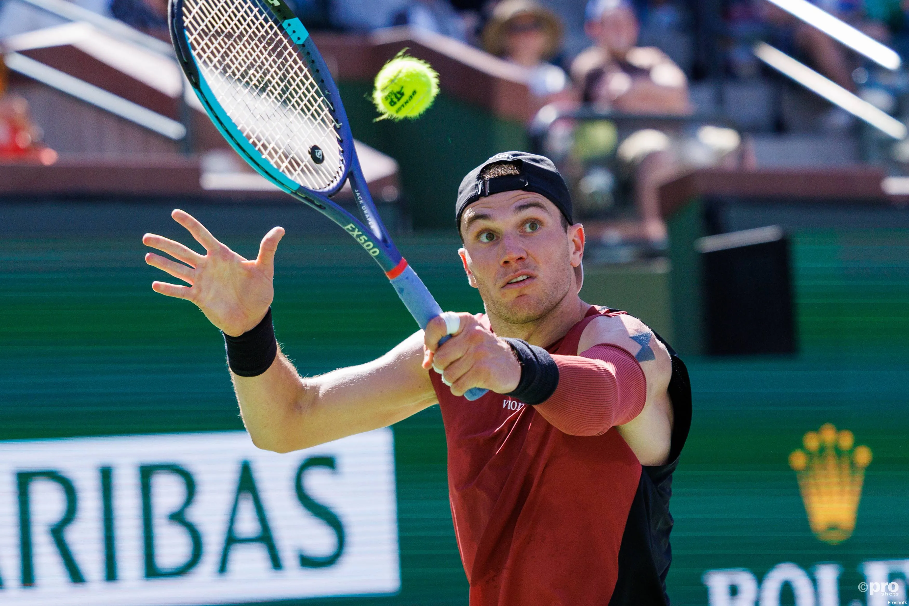 Jack Draper swats back the forehand.