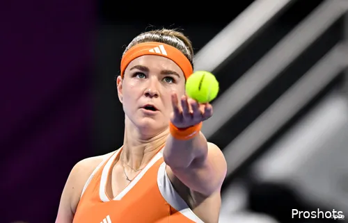 Karolina Muchova serves.