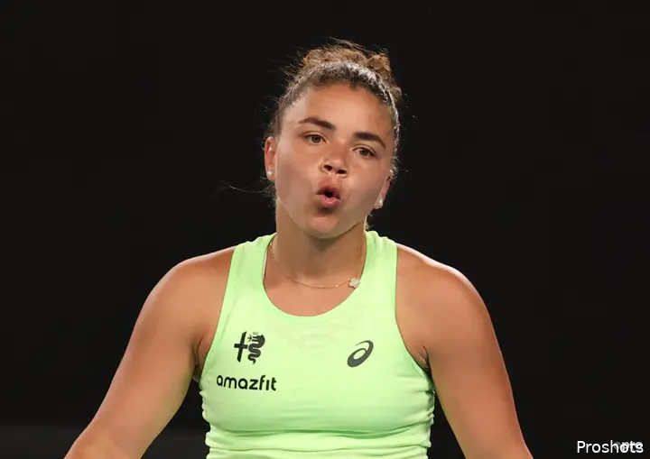 Jasmine Paolini blows air.