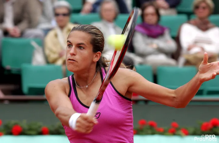 Mauresmo hits return.
