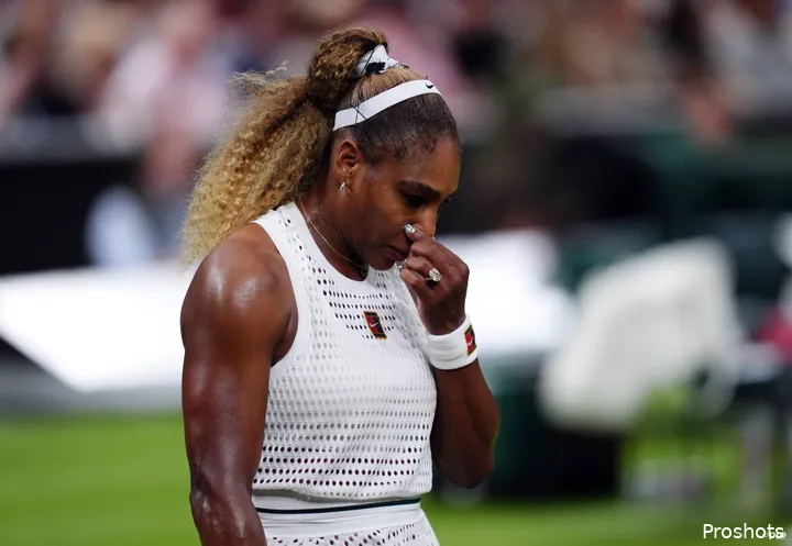 Serena holds nose.