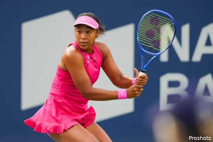 Naomi Osaka preparing to hit the ball