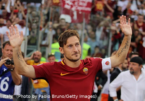 totti mani in alto