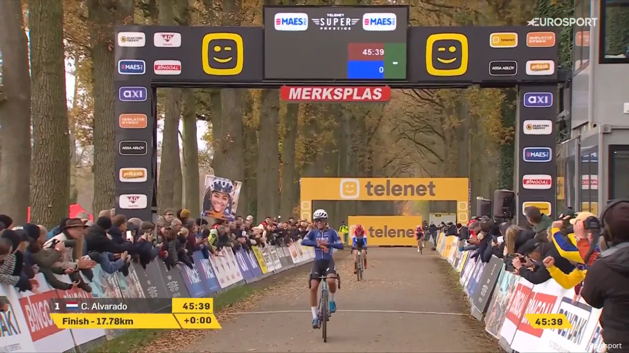 <i>Alvarado across the finish line, a few seconds ahead of Brand</i>