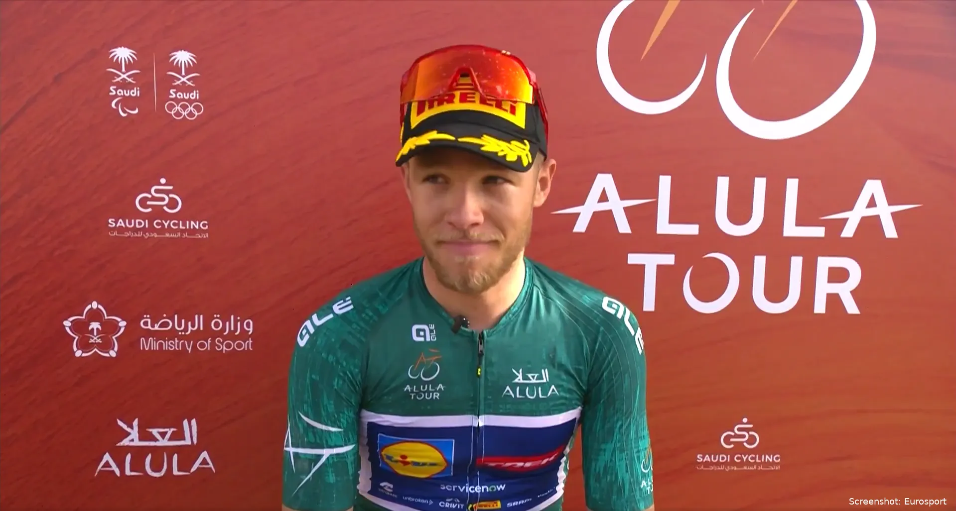 Jonathan Milan speaks to the media after winning stage 2 of the 2026 AlUla Tour