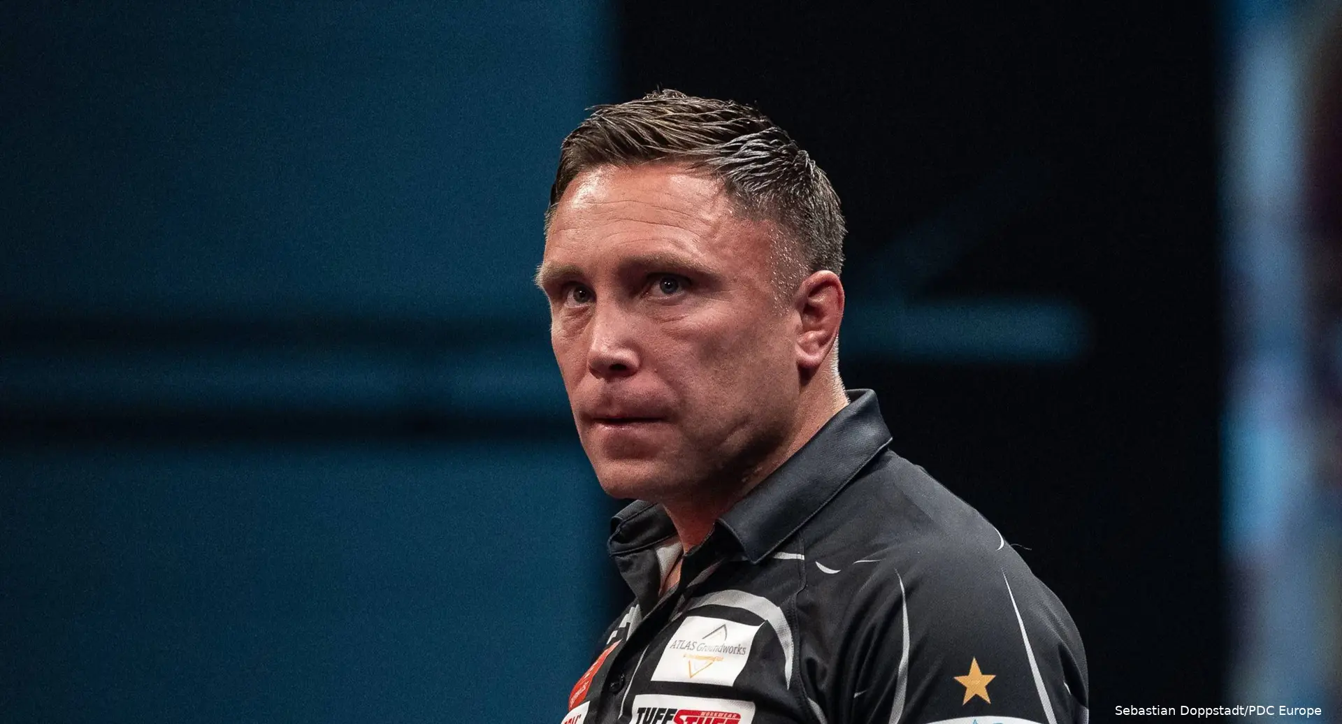 Gerwyn Price looks on
