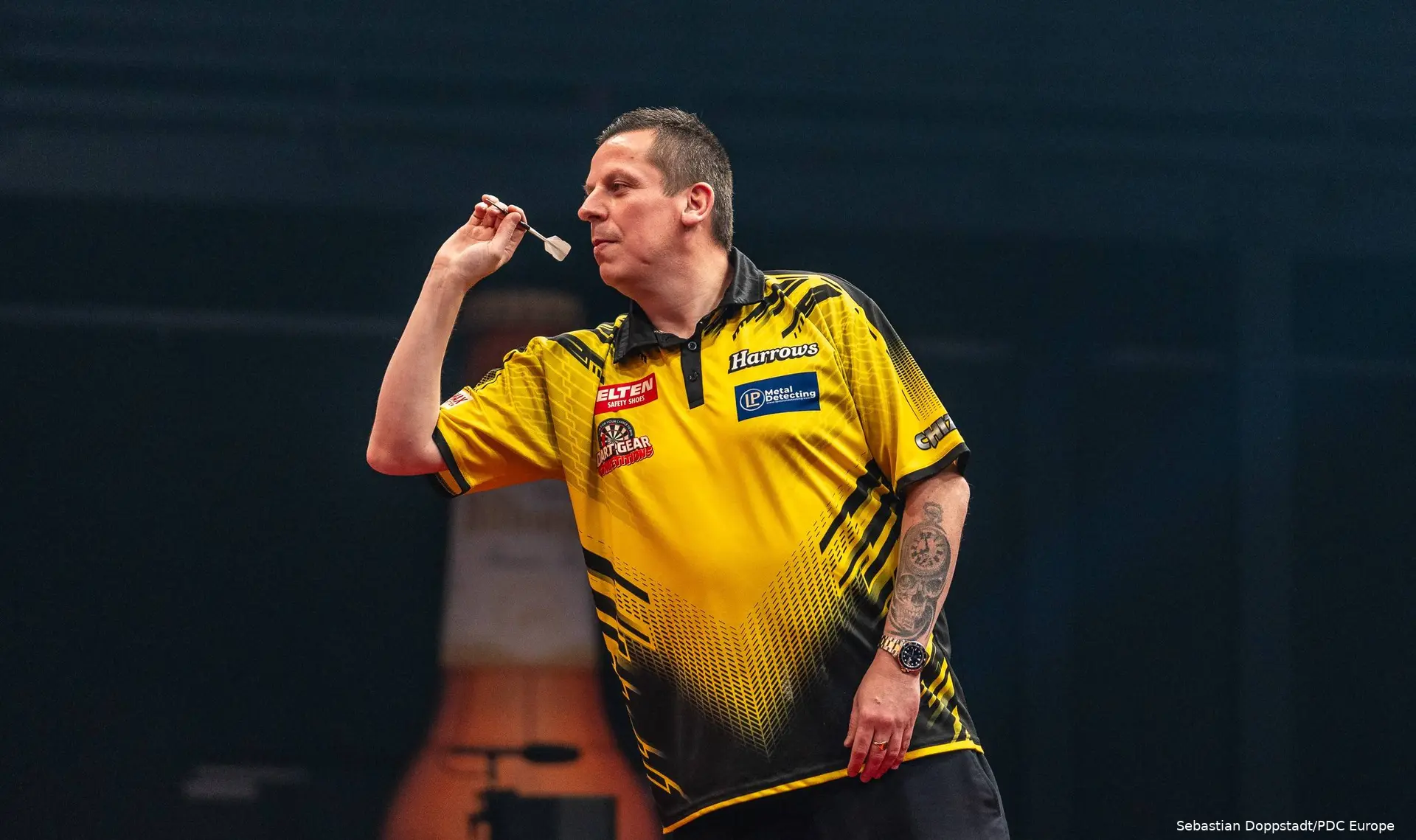 Dave Chisnall in actie op het WK-podium