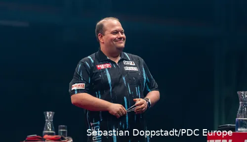 Marcel Hausotter glimlacht naar de zaal