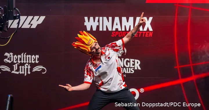 Damon Heta prancing on stage