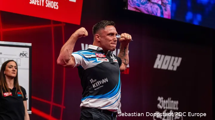 Gerwyn Price flexes his muscles.