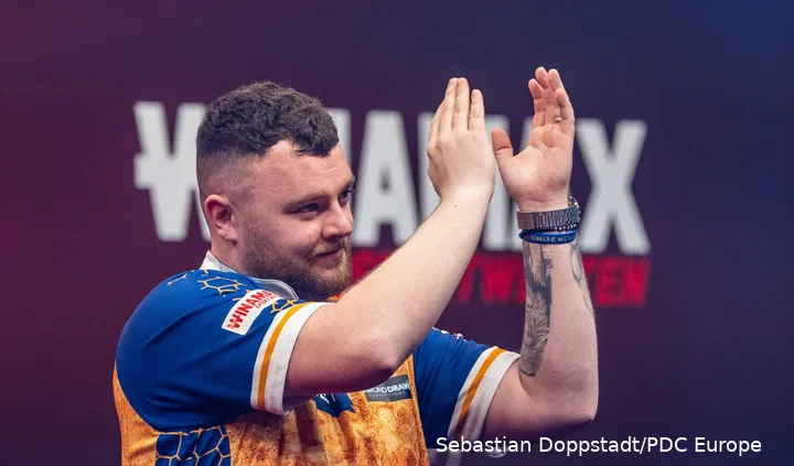 Rock claps towards the crowd during his walk-on.