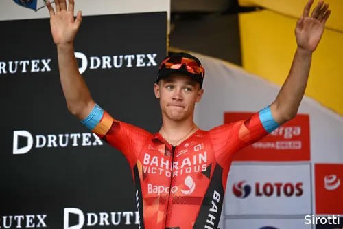 Milan op het podium.