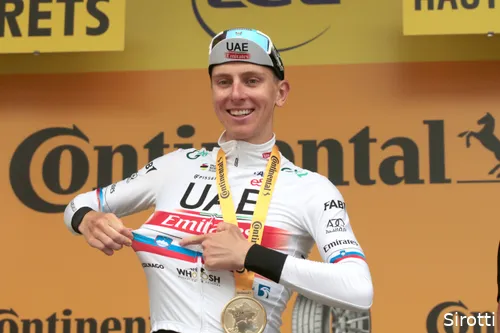 Pogacar wears dons his 'white jersey adorned with the Slovenian tricolore'