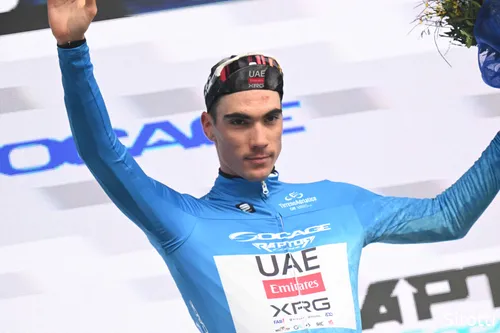 Ayuso proud in his blue leader's jersey