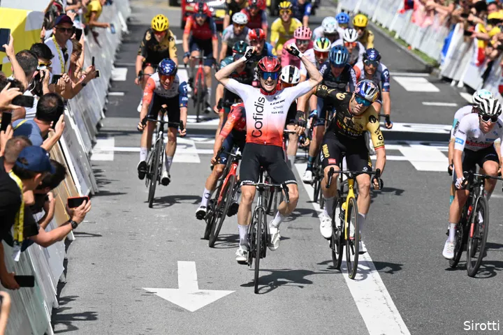 Van Aert slams his handlebars in frustration after a missed opportunity on day two