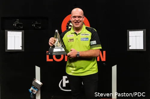 Michael van Gerwen holds the Premier League trophy