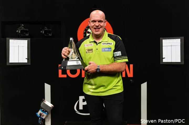 Michael van Gerwen holds the Premier League trophy