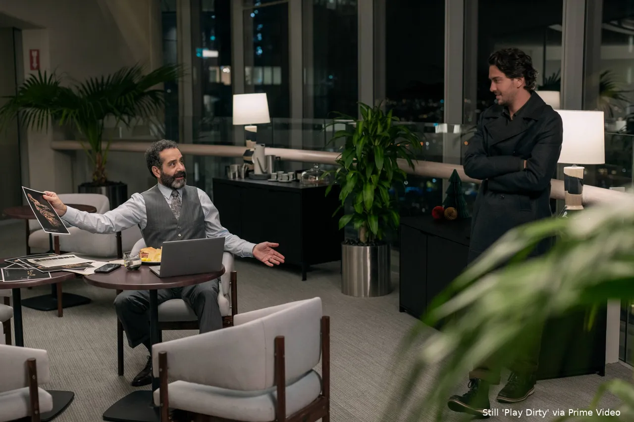 Lozini (Tony Shalhoub) and Kincaid (Nat Wolff) in PLAY DIRTY. Photo Credit Jasin Boland_Prime © Amazon Content Services LLC