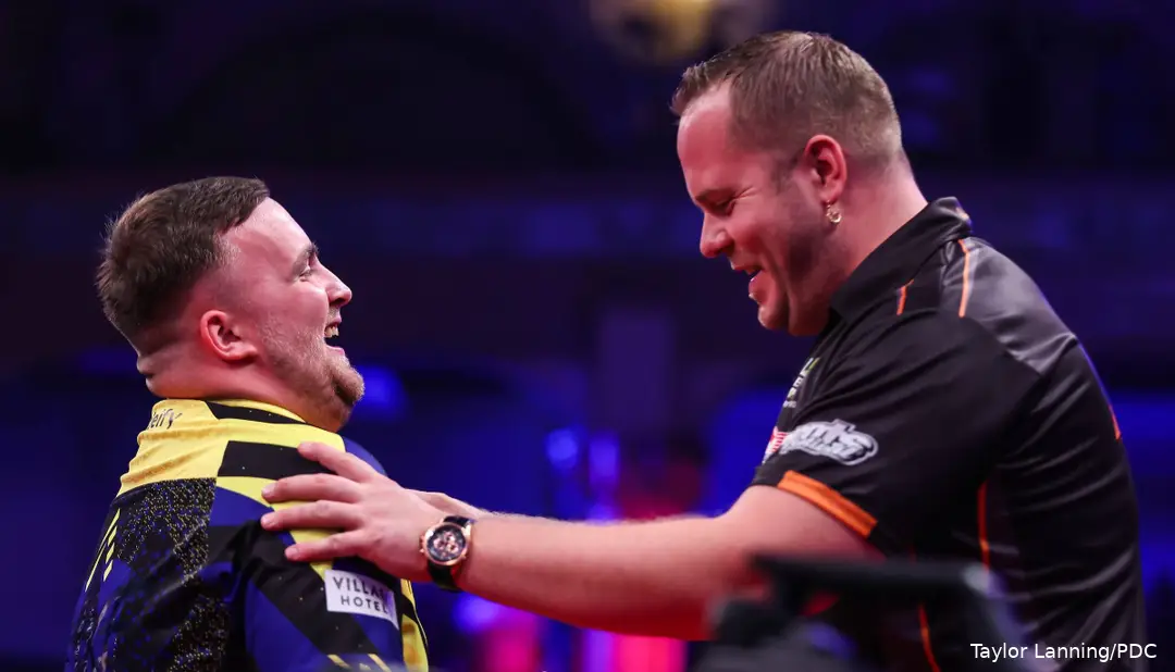 Luke Littler and Dirk van Duijvenbode share a moment on stage.