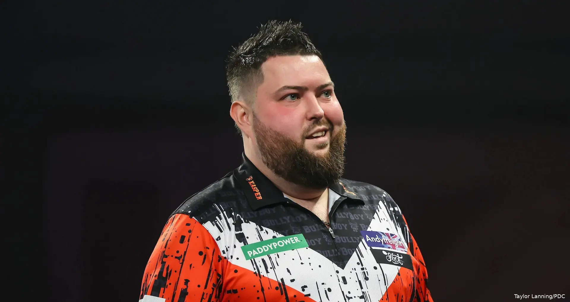 Michael Smith snarls at the camera at PDC World Darts Championship