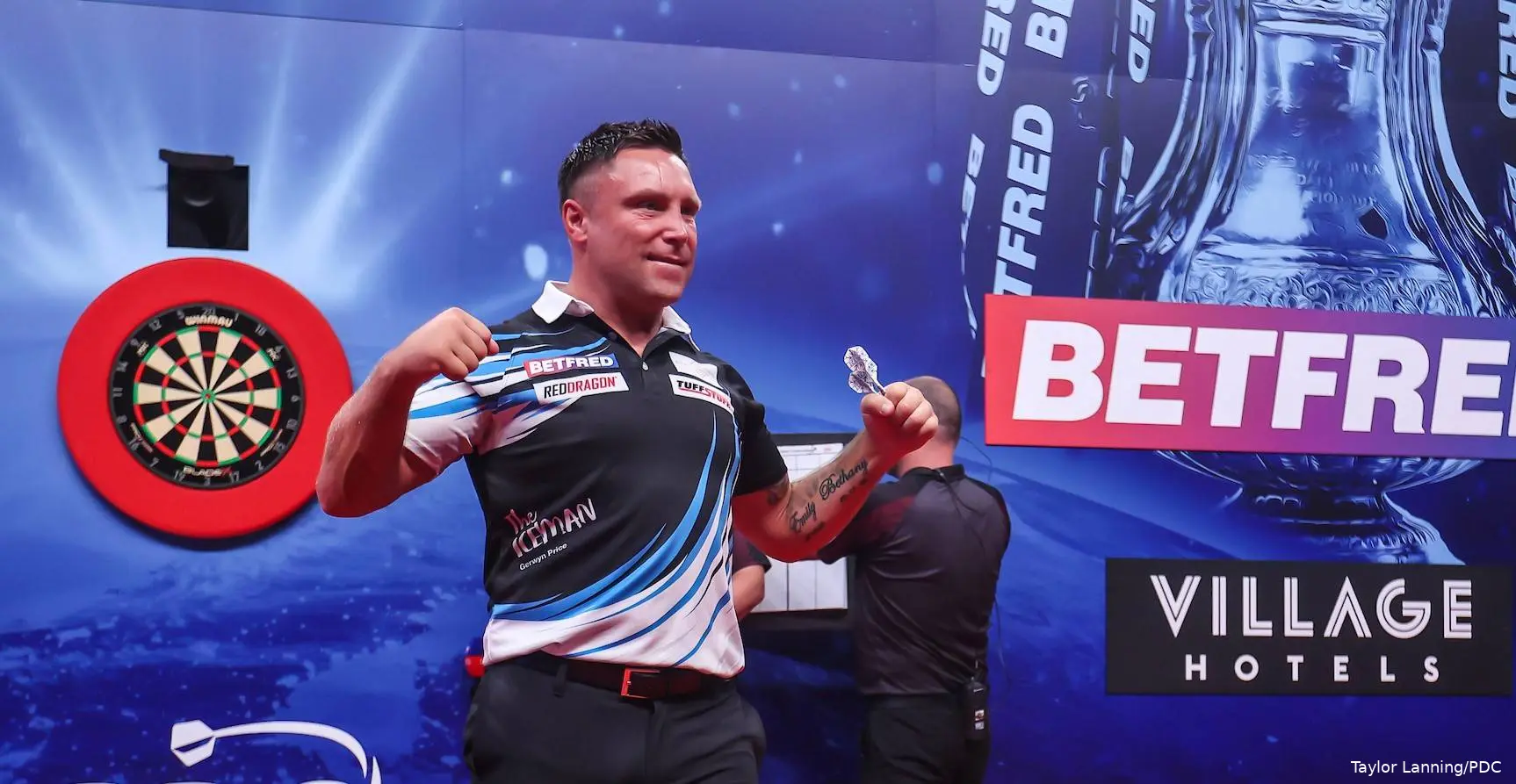 Gerwyn Price pumps his fists