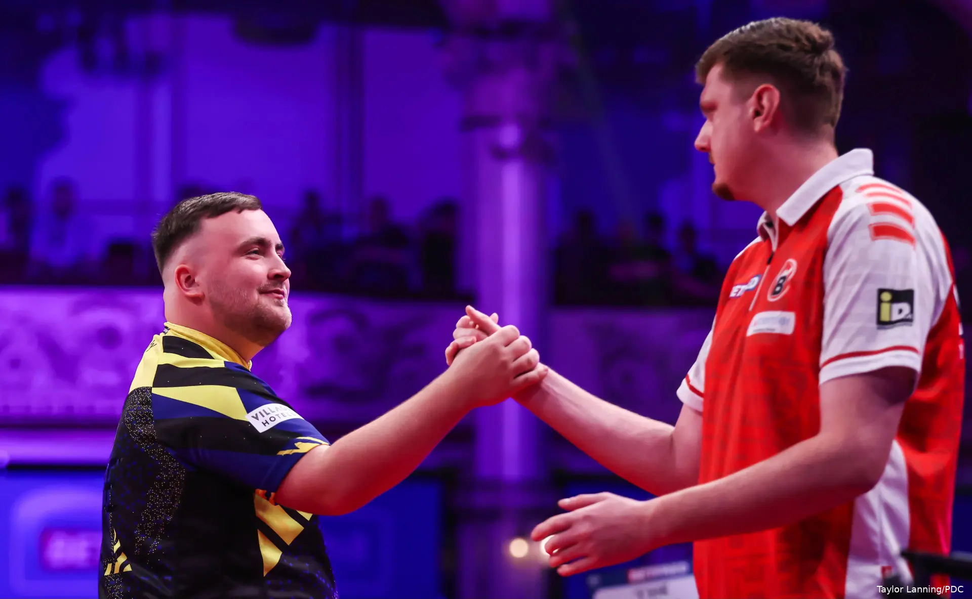 Luke Littler and Niko Springer shake hands at the 2026 World Matchplay