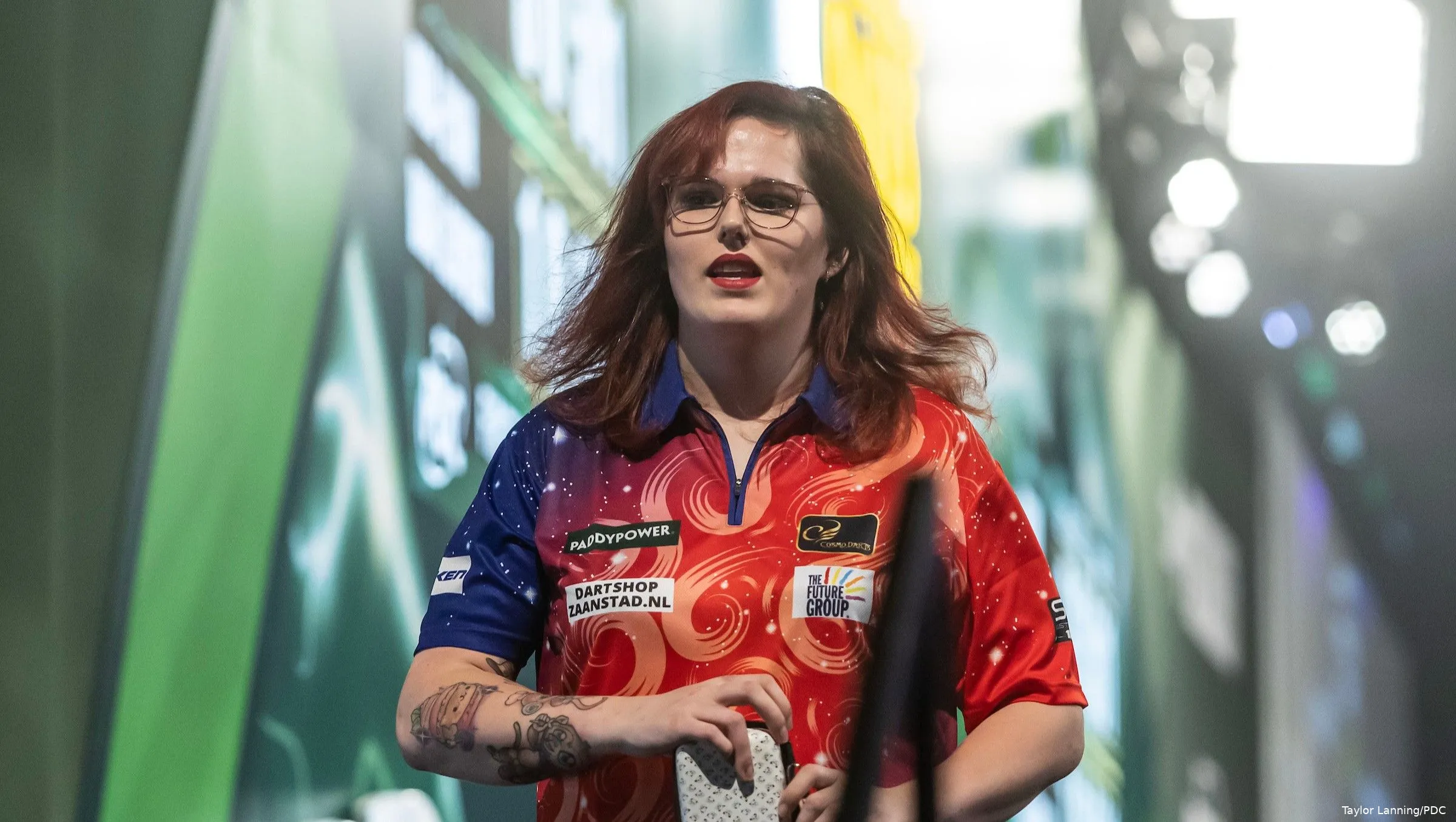 Van Leuven walks off the stage.