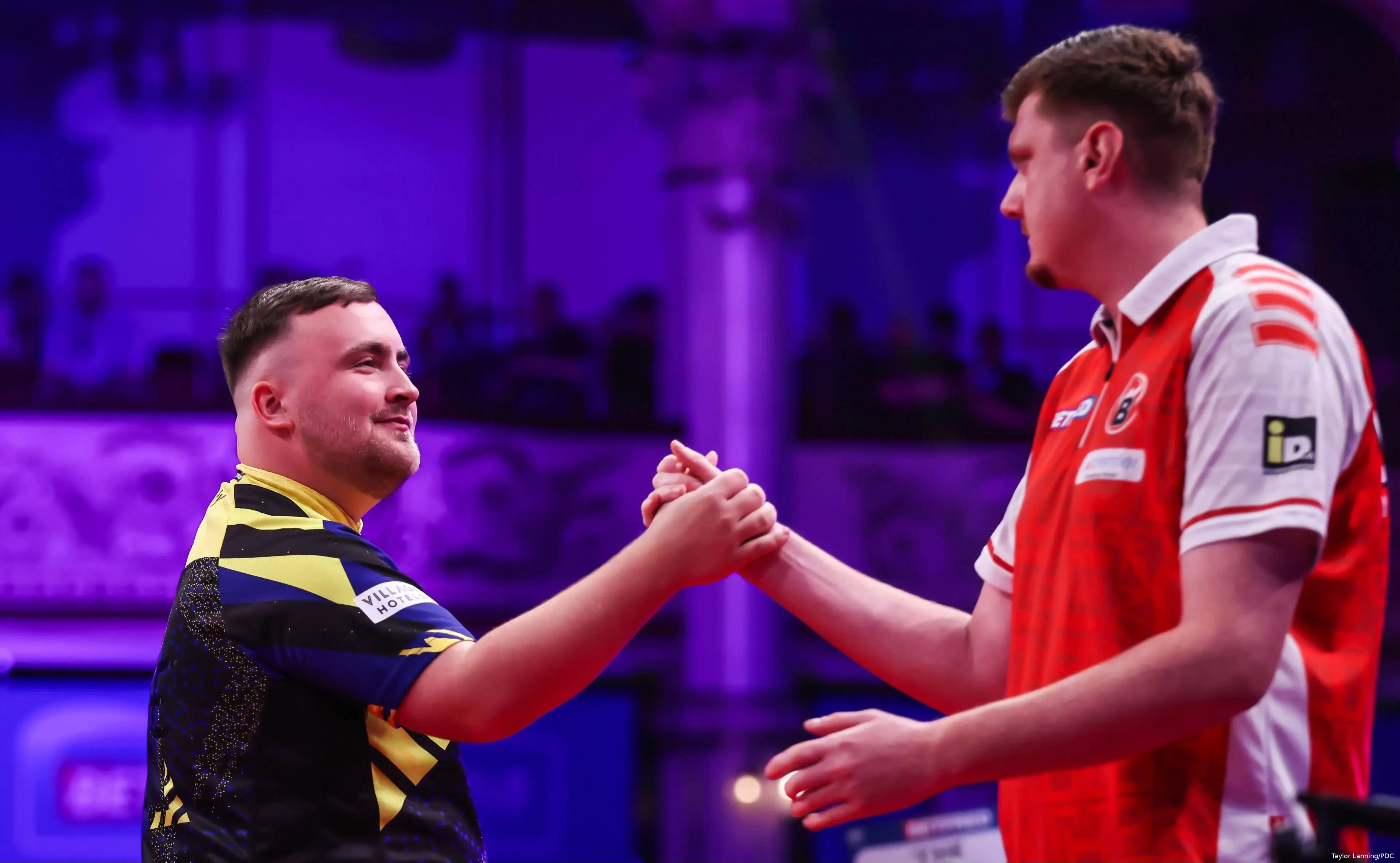 Luke Littler and Niko Springer shake hands at the 2026 World Matchplay
