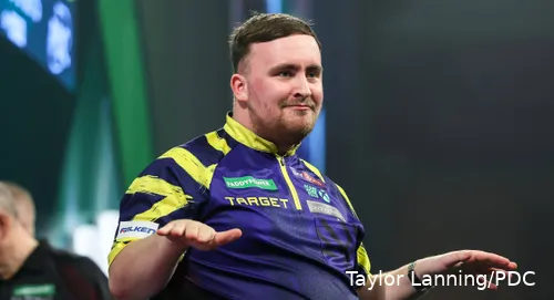 Luke Littler does a dance on stage at the Ally Pally.