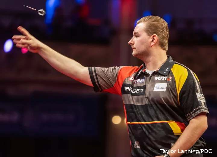 Dimitri van den Bergh plays in the final match of the evening against Mensur Suljovic