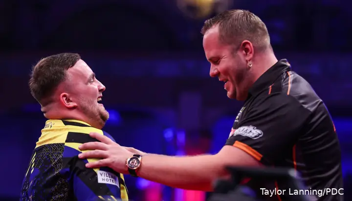 Luke Littler and Dirk van Duijvenbode share a moment on stage.