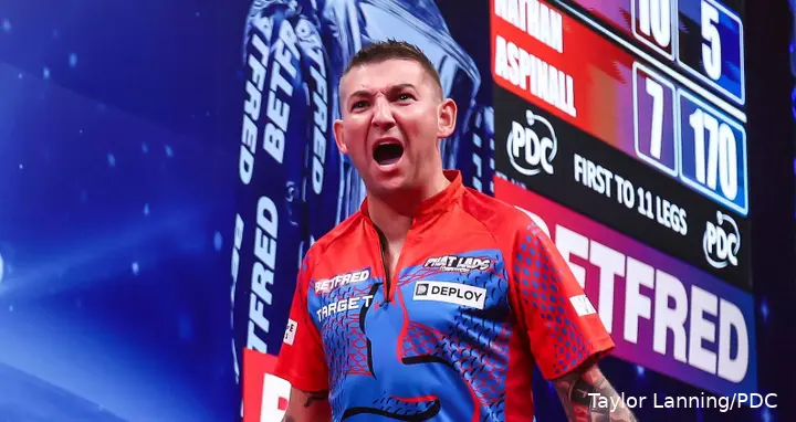Nathan Aspinall passionately celebrating on the Winter Gardens stage