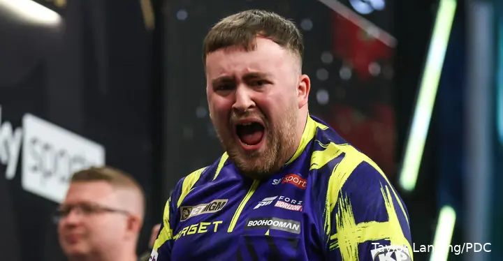 Luke Littler celebrates.