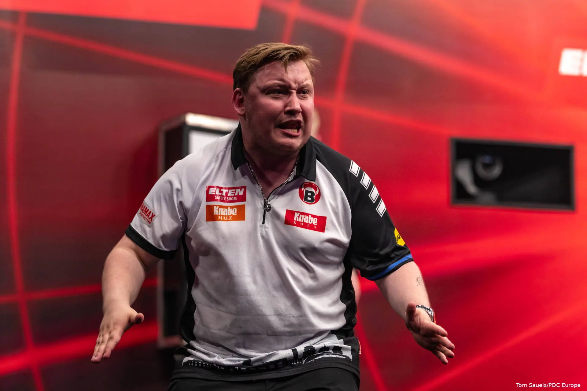 Martin Schindler on stage celebrating