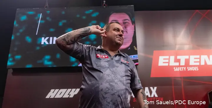 Kim Huybrechts gestures to the crowd
