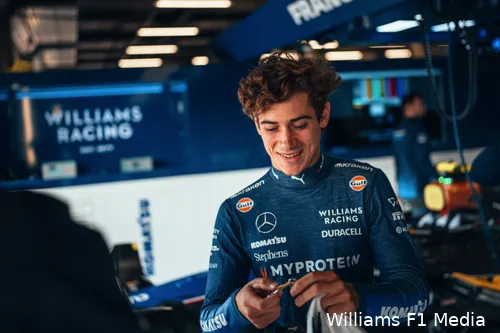 Franco Colapinto inside Williams garage in Abu Dhabi getting ready for a ride in Williams F1 car during 2023 post-season testing