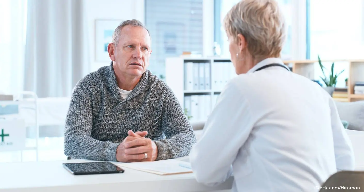 Female doctor concels middle age white male patient iStock-2159649700
