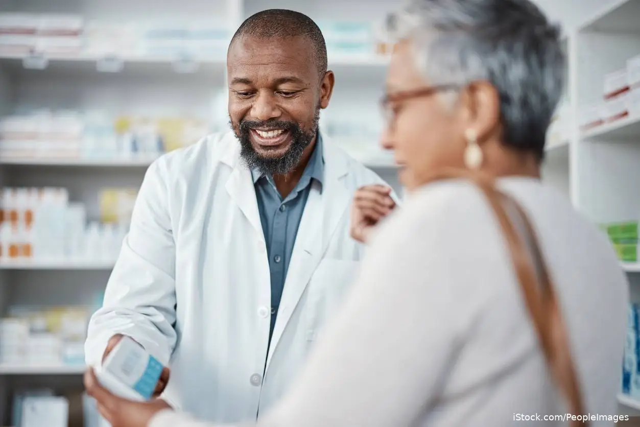 pharmacist counseling patient on medication