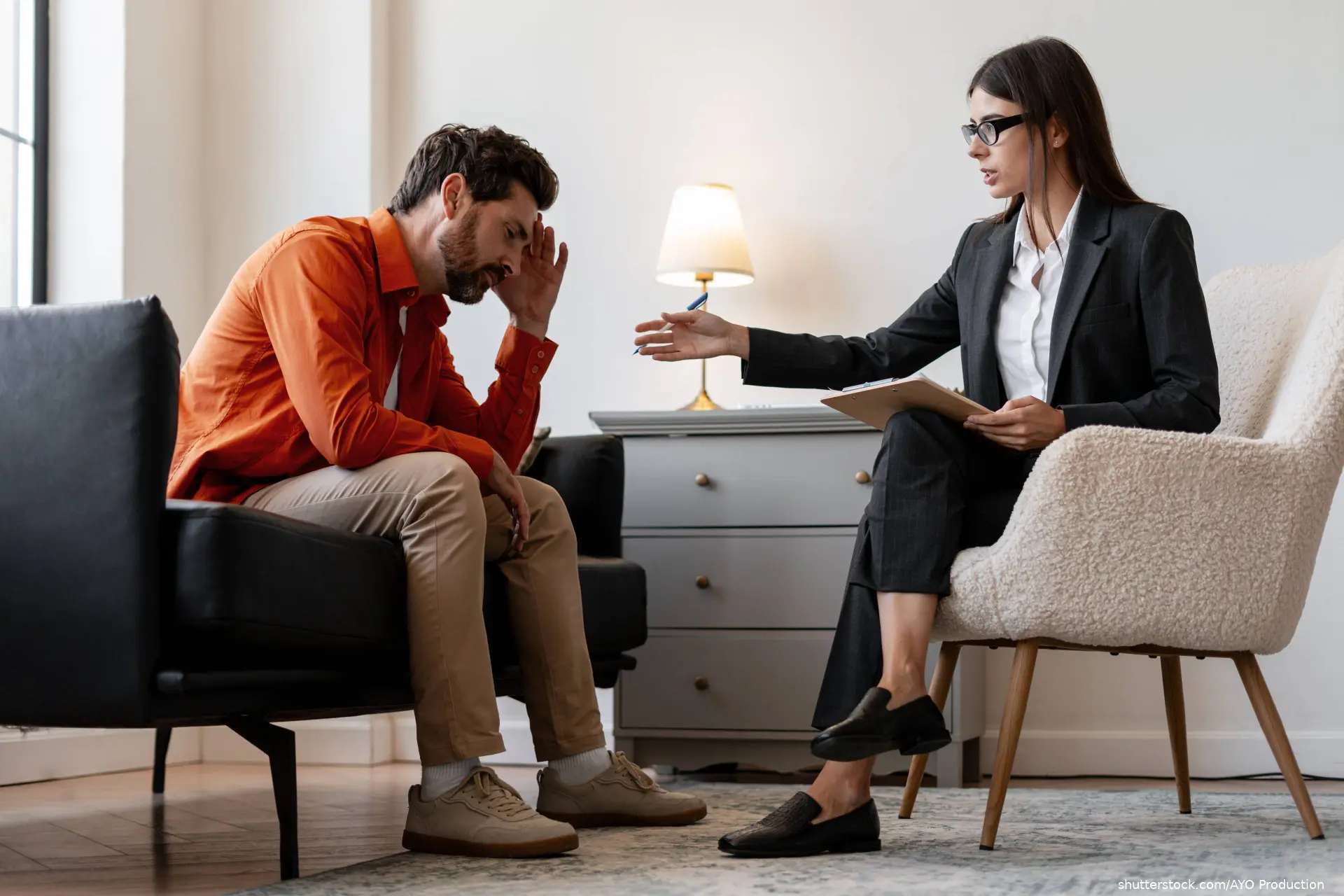 man on couch at psychiatry session