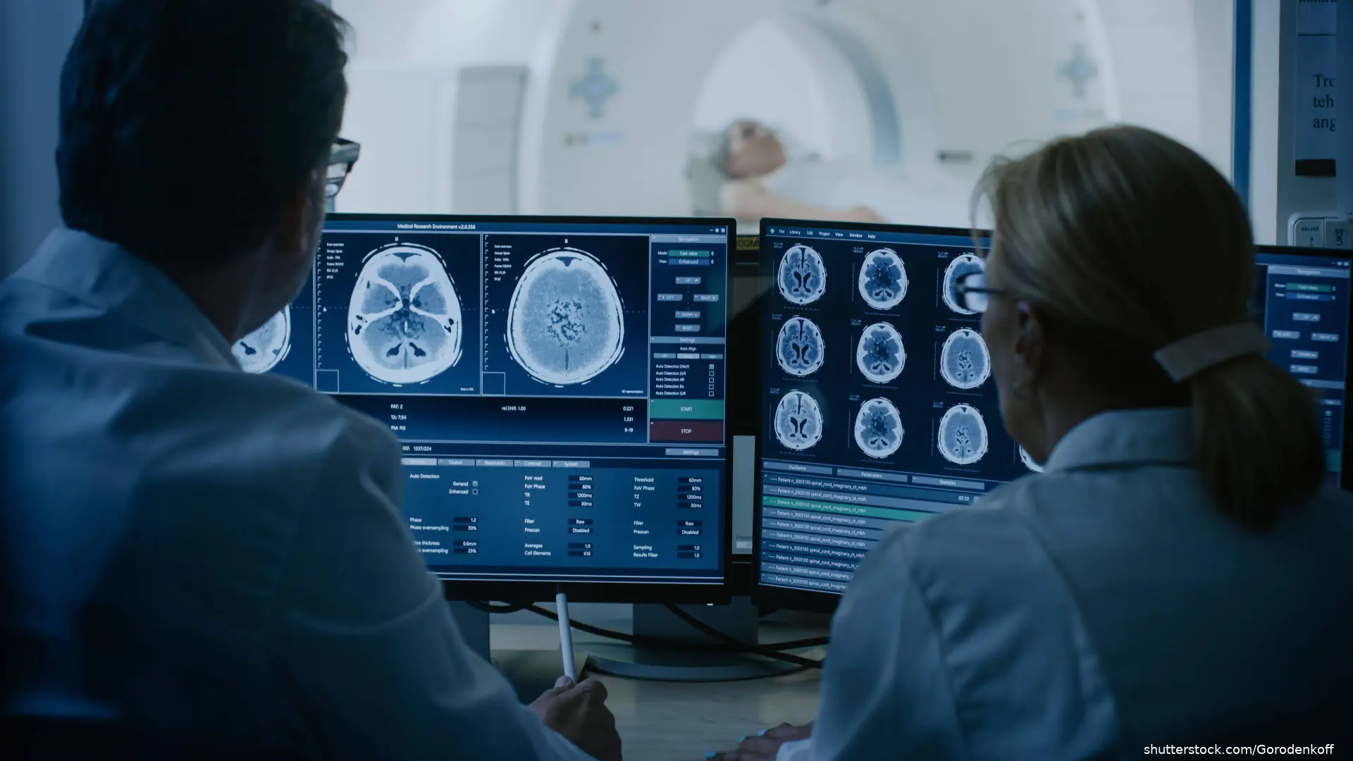 doctor and tech viewing brain MRI