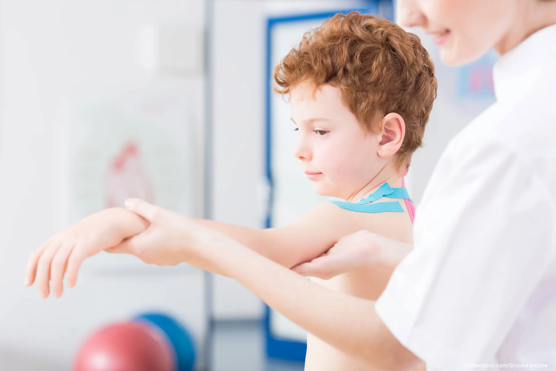 young boy being examined by doctor