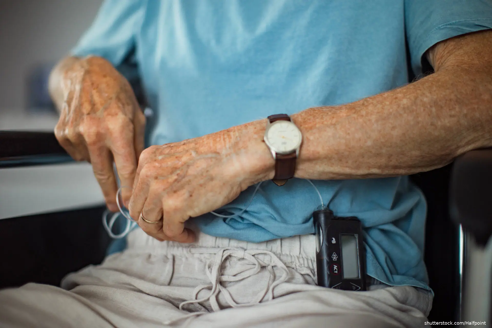 older man wearing insulin pump