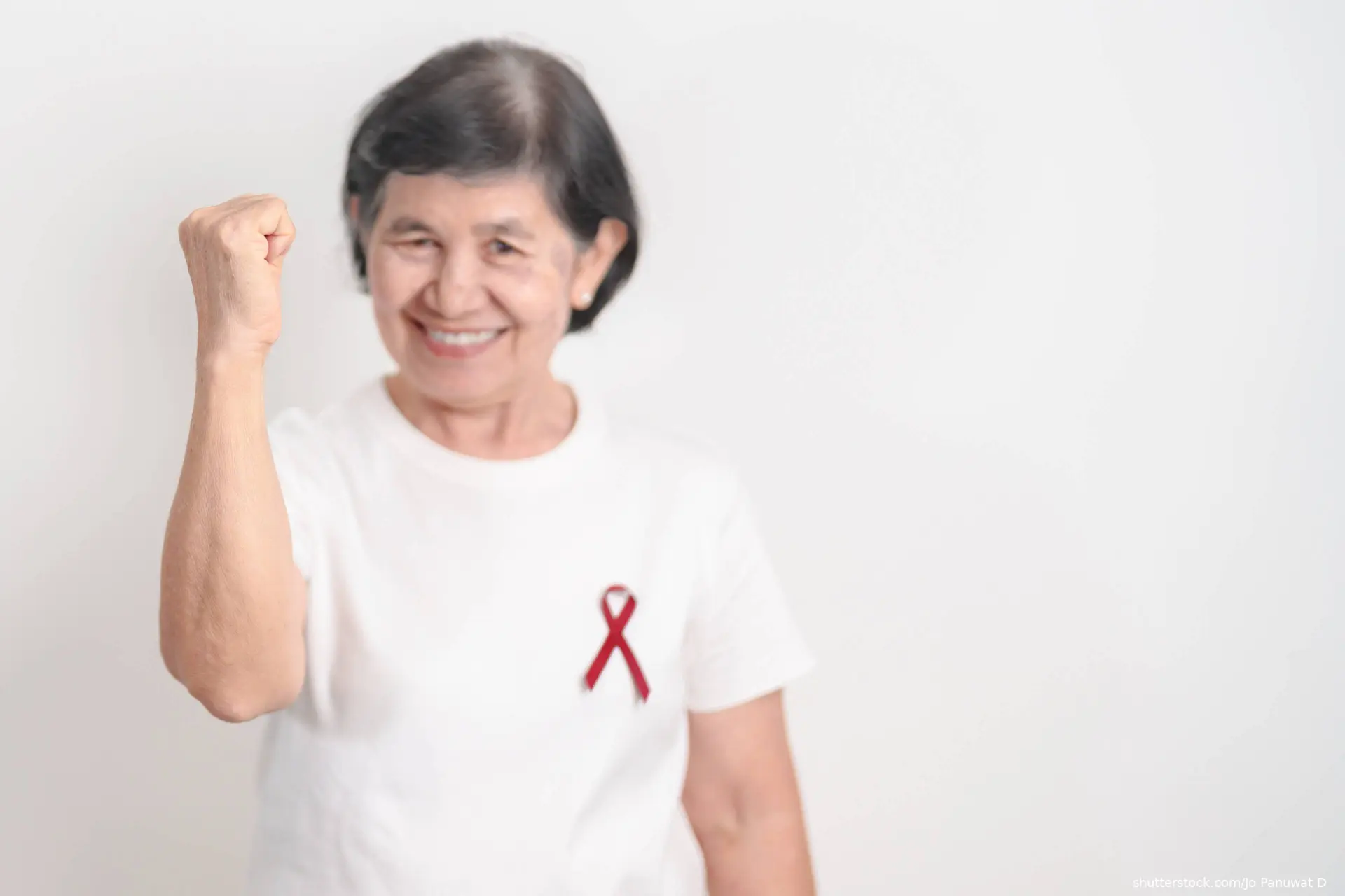 Elderly woman with Burgundy Ribbon for Multiple Myeloma Cancer Awareness
