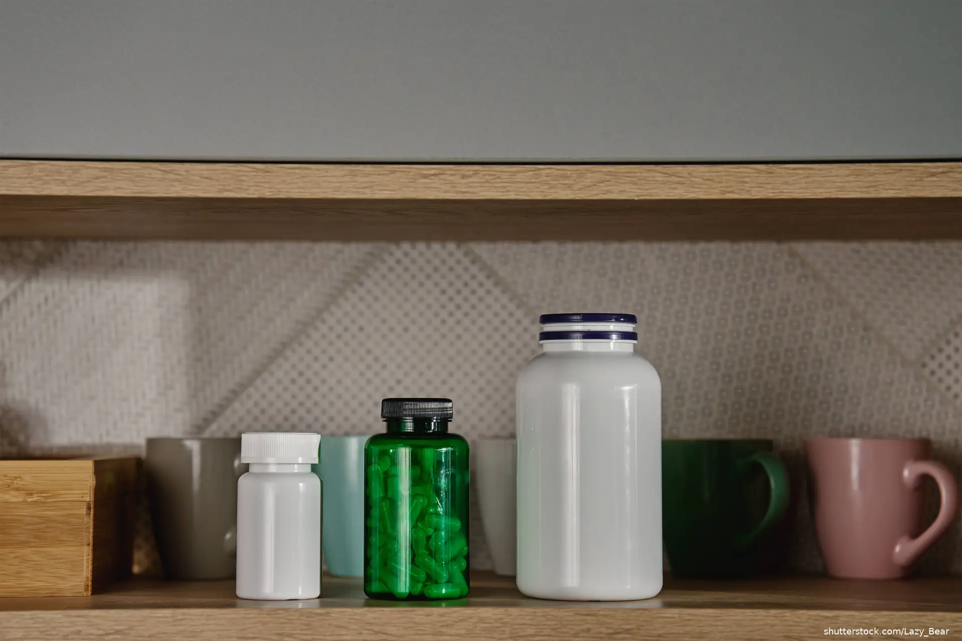 pill bottles in kitchen cabinet