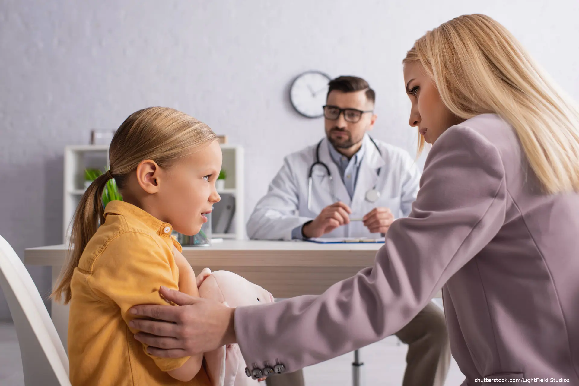 mother and daughter at doctors office
