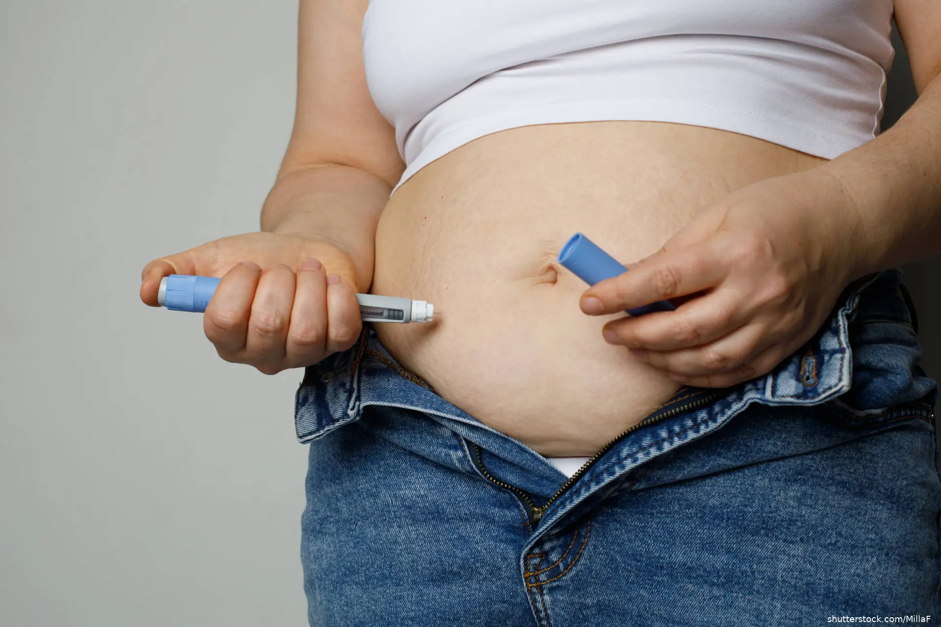 Woman injecting Semaglutide Ozempic injection shutterstock_2507009663