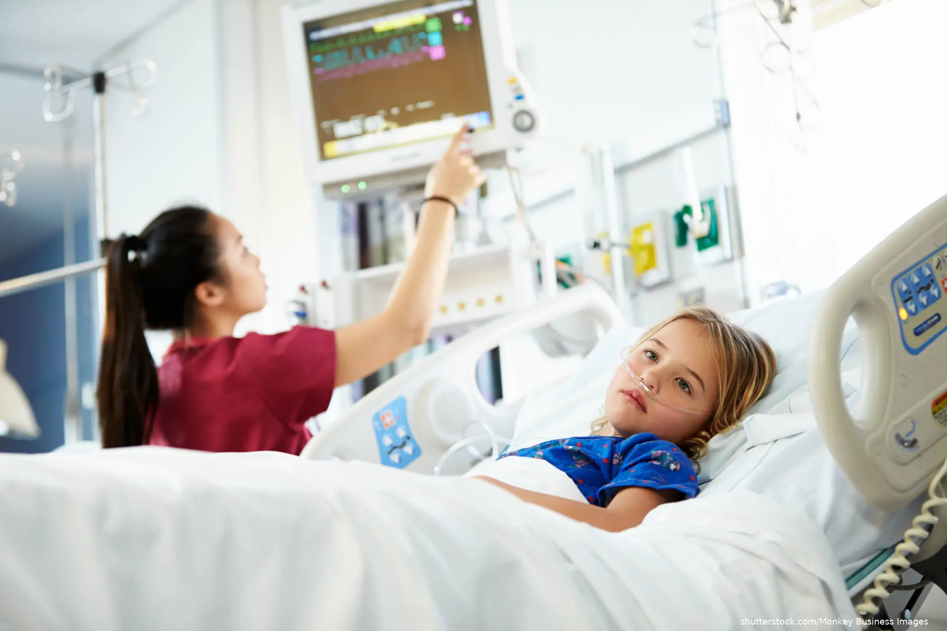 nurse and patient in pediatric ICU