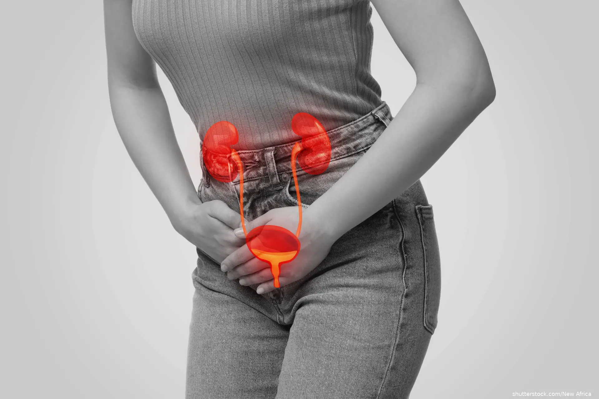 Woman suffering from cystitis on light background