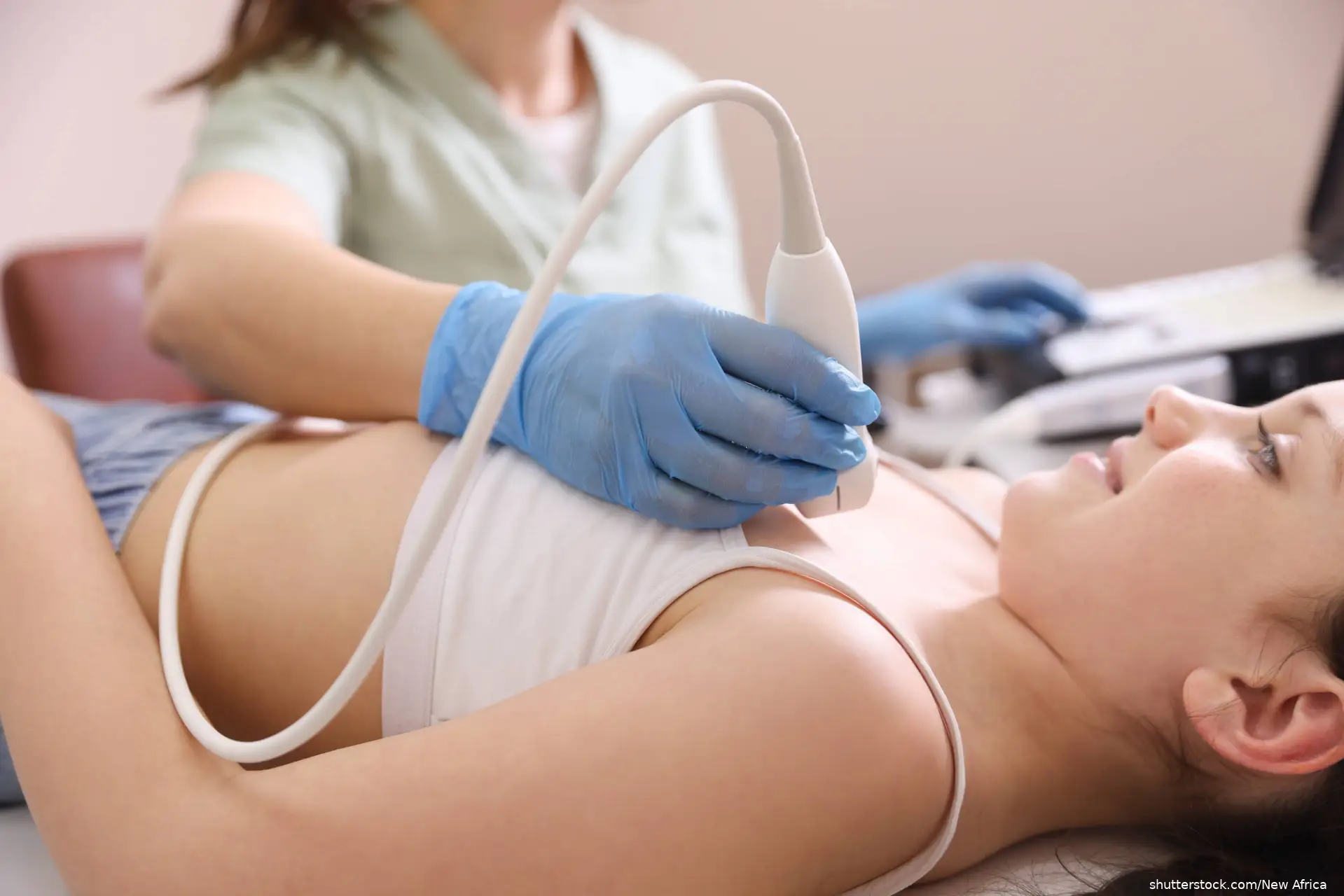 young girl getting echocardiogram